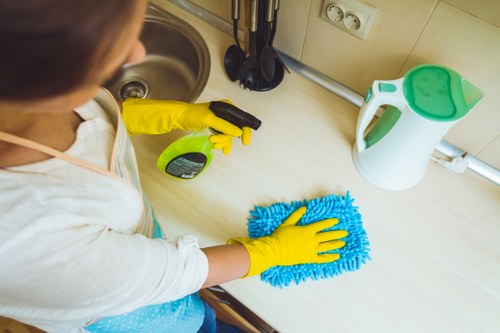 Carpet cleaning team reviewing site hazards and safety controls