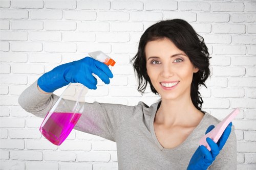 Cleaner preparing a flat for a one-off deep clean in Swiss Cottage