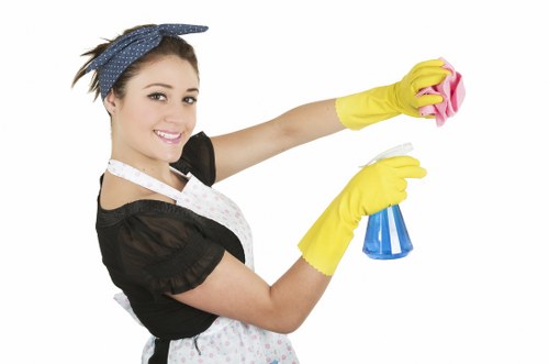 Local cleaner preparing a Swisscottage Airbnb bathroom for the next guest
